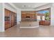 Gourmet kitchen featuring custom cabinets, granite counters, and modern appliances at 22463 N 54Th St, Phoenix, AZ 85054