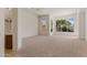 Bright living room with many windows, neutral carpet and an open layout at 22463 N 54Th St, Phoenix, AZ 85054