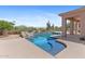 This custom pool features a serene desert backdrop, creating an oasis for relaxation and recreation at 22463 N 54Th St, Phoenix, AZ 85054
