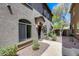 Charming exterior view showcasing the front entrance and landscaped walkway at 2250 E Deer Valley Rd # 24, Phoenix, AZ 85024