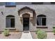 Inviting front entrance with a covered porch and well-maintained landscaping offering a warm welcome to residents and guests at 2250 E Deer Valley Rd # 24, Phoenix, AZ 85024