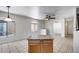 Open kitchen with stainless steel appliances and center island, adjacent to living area at 2250 E Deer Valley Rd # 24, Phoenix, AZ 85024