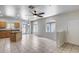 Open living area featuring tile flooring and kitchen with large island and stainless appliances at 2250 E Deer Valley Rd # 24, Phoenix, AZ 85024