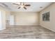 Bright bedroom featuring wood-look flooring and a view into an upstairs hallway at 3133 N Medallion Ct, Casa Grande, AZ 85122
