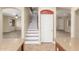 Inviting entryway showcases a staircase and provides a view of the adjacent living area at 3133 N Medallion Ct, Casa Grande, AZ 85122