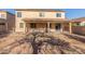 Exterior facade with covered patio and privacy fence for backyard seclusion at 3133 N Medallion Ct, Casa Grande, AZ 85122