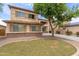 Beautiful two-story home featuring a well-kept lawn, modern design, and bright stucco at 3133 N Medallion Ct, Casa Grande, AZ 85122