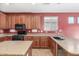 Kitchen with granite countertops, stainless steel appliances, and dark wood cabinets at 3133 N Medallion Ct, Casa Grande, AZ 85122