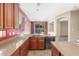 Bright and airy kitchen with modern cabinetry and a view of the living and dining areas at 3133 N Medallion Ct, Casa Grande, AZ 85122