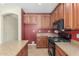 Kitchen featuring modern appliances, granite countertops, and stylish cabinetry at 3133 N Medallion Ct, Casa Grande, AZ 85122