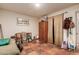 Spacious basement with terracotta tiled floors, storage, and pet supplies at 355 E Fillmore St, Tempe, AZ 85288
