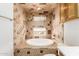 Bright bathroom features a round soaking tub and decorative tiled walls at 355 E Fillmore St, Tempe, AZ 85288