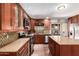 Well-equipped kitchen with a center island, updated appliances, and ample counter space at 355 E Fillmore St, Tempe, AZ 85288