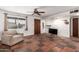 Cozy living room area with a large window and unique tile flooring throughout the space at 355 E Fillmore St, Tempe, AZ 85288