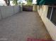 Fenced backyard features low-maintenance gravel landscaping, and close to the building for convienience at 3601 E Taro Ln, Phoenix, AZ 85050