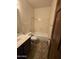 Standard bathroom including tub, toilet, vanity with sink, towel racks, and lighting fixture at 3601 E Taro Ln, Phoenix, AZ 85050