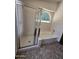 Bathroom featuring shower stall, tub, and window with awning for natural light at 3601 E Taro Ln, Phoenix, AZ 85050