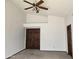 This is a spacious main bedroom featuring neutral carpeting and high ceilings at 3601 E Taro Ln, Phoenix, AZ 85050