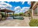 Backyard oasis with pool, jacuzzi, gazebo, desert plants and mountain views on a sunny day at 37440 N 104Th Pl, Scottsdale, AZ 85262
