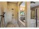 Spa-like bathroom featuring a stand-alone shower and soaking tub, set within a spacious, bright, and modern design at 37440 N 104Th Pl, Scottsdale, AZ 85262