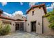 Attractive single Gathering home with gray stucco and a spanish tile roof at 37440 N 104Th Pl, Scottsdale, AZ 85262
