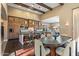 Modern kitchen with a large island, wine coolers, and wood cabinets, offering ample storage space at 37440 N 104Th Pl, Scottsdale, AZ 85262