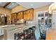 Spacious kitchen with granite countertops, an island with bar stool seating, and stainless steel appliances at 37440 N 104Th Pl, Scottsdale, AZ 85262