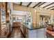 A well-equipped kitchen island features a sink and dishwasher, and is surrounded by plenty of counter space at 37440 N 104Th Pl, Scottsdale, AZ 85262