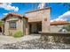 Backyard area featuring an outdoor kitchen, sitting area, and an outdoor bar at 37440 N 104Th Pl, Scottsdale, AZ 85262