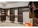 Spacious walk-in closet with custom shelves, drawers, and ample storage for organization at 37440 N 104Th Pl, Scottsdale, AZ 85262