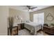 Comfortable bedroom with wood floors, a desk, and a bright window at 3790 W White Canyon Rd, San Tan Valley, AZ 85144