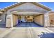 Spacious garage with ample storage cabinets and room for vehicles and projects at 3790 W White Canyon Rd, San Tan Valley, AZ 85144