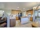 Modern kitchen with wood cabinets, stainless steel appliances, and a center island at 3790 W White Canyon Rd, San Tan Valley, AZ 85144