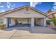 Spacious three-car garage with ample parking and storage space at 3834 E Windsong Dr, Phoenix, AZ 85048