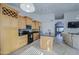 Beautiful kitchen with stainless steel appliances, wooden cabinetry, an island, and ample counter space for cooking at 3834 E Windsong Dr, Phoenix, AZ 85048