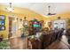 Comfortable living room featuring yellow walls, hard floors, and natural light at 3926 W Christy Dr, Phoenix, AZ 85029
