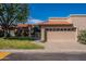 Charming home with a well-maintained lawn, paver driveway, and a two-car garage at 4116 E Sunnyside Dr, Phoenix, AZ 85028