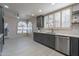 Modern kitchen with stainless steel appliances, stylish cabinetry, and generous counter space at 4116 E Sunnyside Dr, Phoenix, AZ 85028