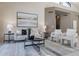 Inviting living room with vaulted ceilings, comfortable seating, and contemporary decor showcasing bright and airy space at 4116 E Sunnyside Dr, Phoenix, AZ 85028