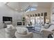 Bright living room boasts a fireplace, plush seating, and an abundance of natural light at 4116 E Sunnyside Dr, Phoenix, AZ 85028