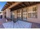 The home has a spacious covered patio with sliding glass doors and windows at 4116 E Sunnyside Dr, Phoenix, AZ 85028