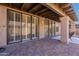 Covered patio featuring sliding glass doors and view of the backyard at 4116 E Sunnyside Dr, Phoenix, AZ 85028
