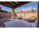 The home has a spacious patio, beautiful hardscape and relaxing seating at 4116 E Sunnyside Dr, Phoenix, AZ 85028
