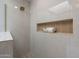 Modern shower with a shower niche and natural light at 4116 E Sunnyside Dr, Phoenix, AZ 85028