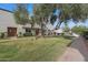 Charming townhome complex surrounded by lush greenery, mature trees, and well-kept lawns at 4248 N Parkway Ave, Scottsdale, AZ 85251