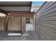 Pathway leading to a private patio area with a covered pergola and access to a storage shed at 4248 N Parkway Ave, Scottsdale, AZ 85251