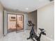 Bonus space with open sliding glass doors leading to an outside patio at 4317 E Glenrosa Ave, Phoenix, AZ 85018
