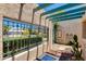 Private courtyard featuring a pergola, cactus, an outdoor table and seating at 4317 E Glenrosa Ave, Phoenix, AZ 85018