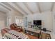 Cozy living room with beamed ceilings and a comfortable seating area at 4317 E Glenrosa Ave, Phoenix, AZ 85018