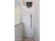 Bathroom shower featuring light tiles, rock flooring, and rainfall shower head at 4317 E Glenrosa Ave, Phoenix, AZ 85018